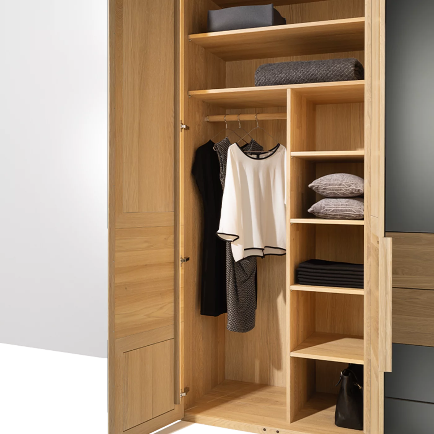 Solid wooden wardrobe with practical interior Wardrobe with coloured glass fronts in oak white oil with practical interior