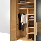 Solid wooden wardrobe with practical interior Wardrobe with coloured glass fronts in oak white oil with practical interior