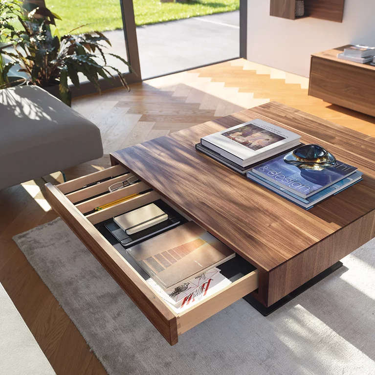 Elegant living room table lift in walnut with open drawer