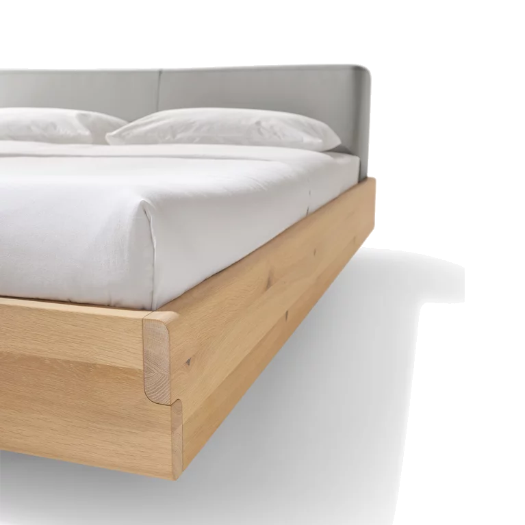 nox bed in wild oak white oil with leather headboard, detailed view