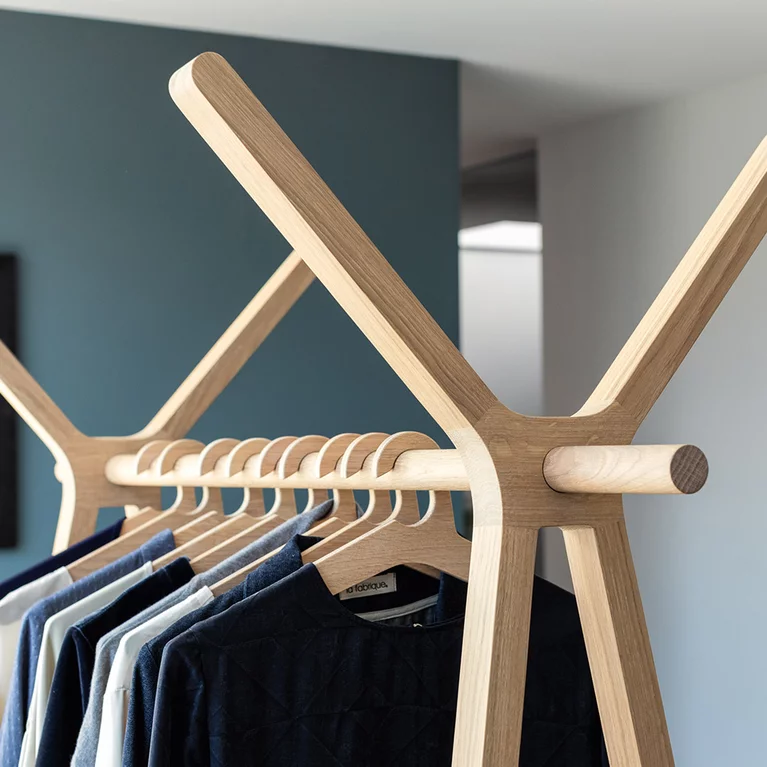 coat rack hood+ in oak white oil with basic elements connected by a rail, detailed view