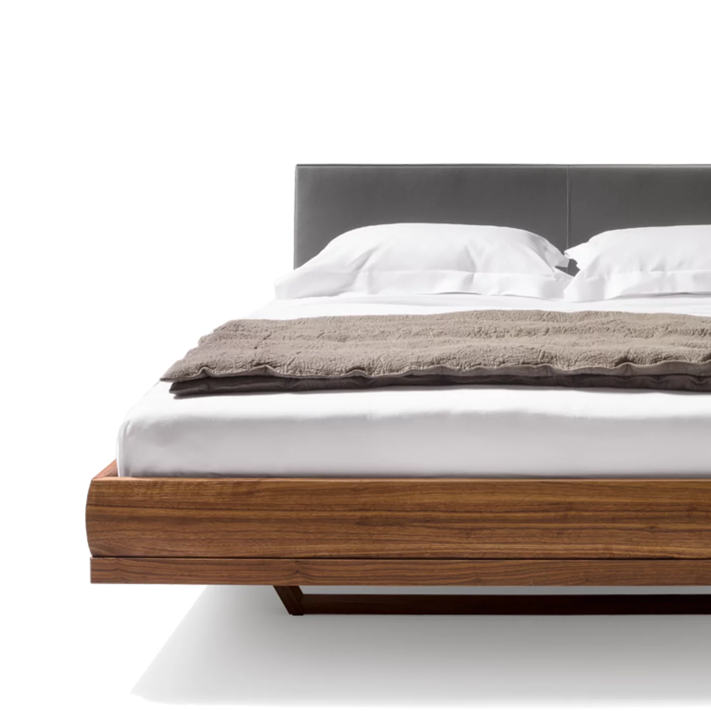 riletto bed in walnut with leather headboard and wooden frame