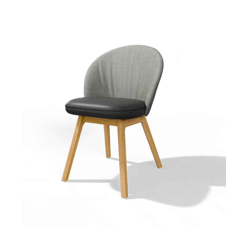 comfortable upholstered chair flor made of leather seat shell and fabric backrest with wooden frame in solid oak