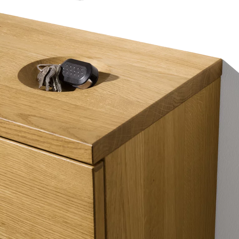 detailed view of the key recess of a cubus hallway chest of drawers in solid oak