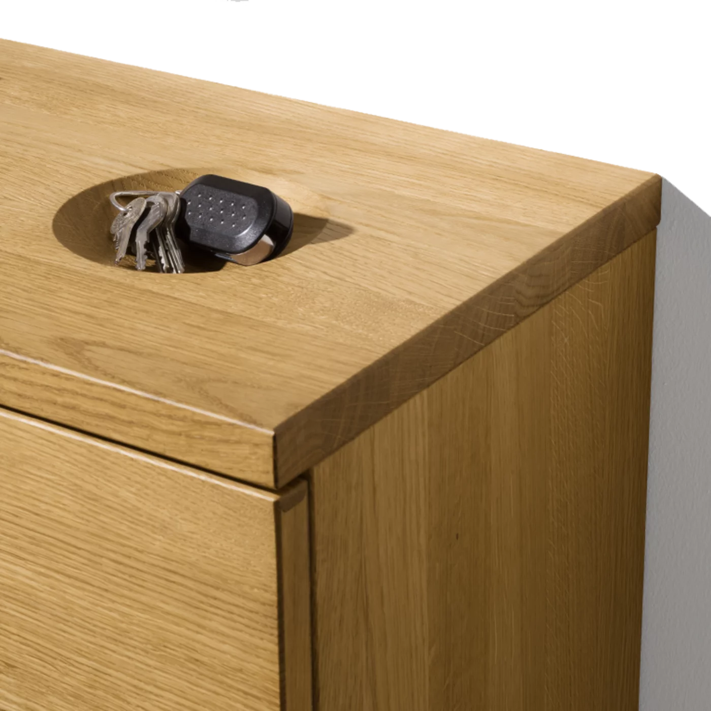 detailed view of the key recess of a cubus hallway chest of drawers in solid oak