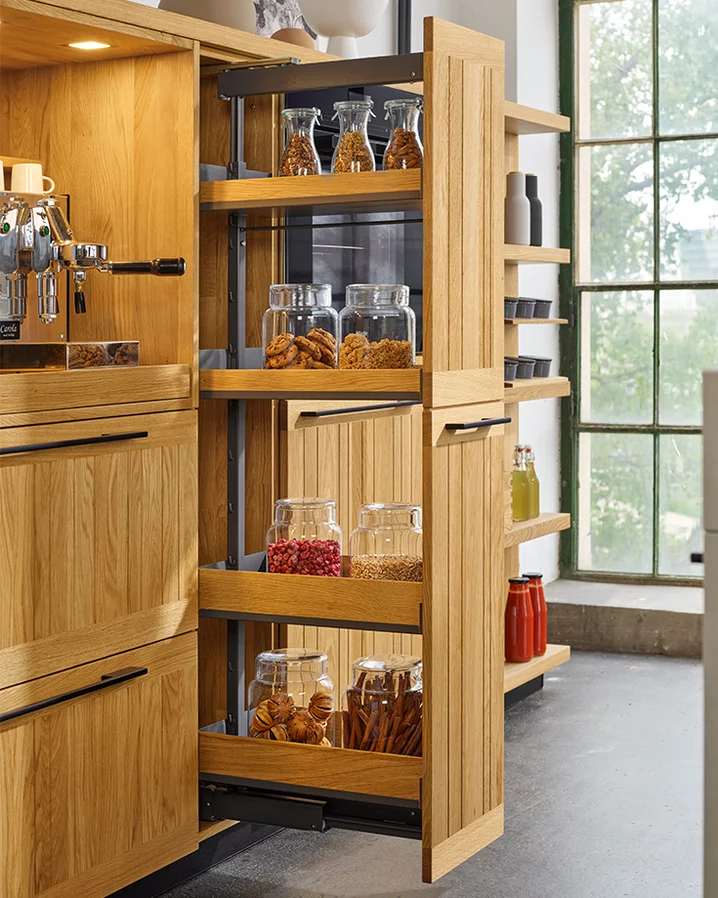 tall unit in oak with apothecary pull-out in chrome railing