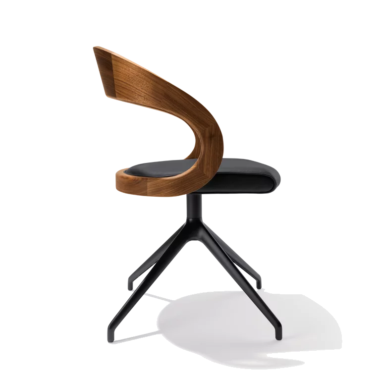 comfortable swivel chair girado with leather seat, frame in matt black and backrest in walnut, side view