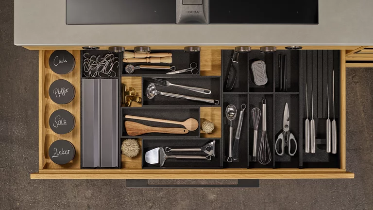 natural wood kitchen echt.zeit in oak drawer with large cutlery tray