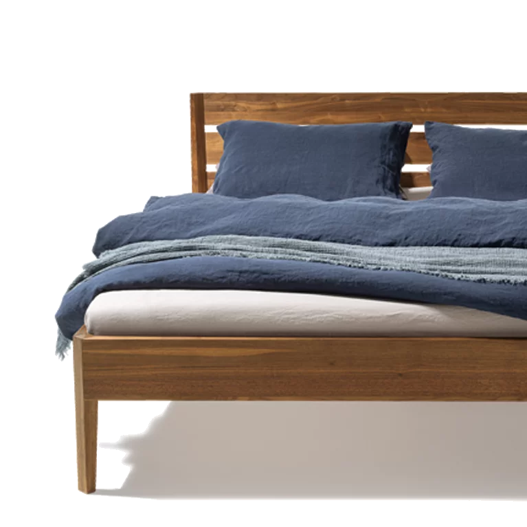 light wooden bed in real walnut