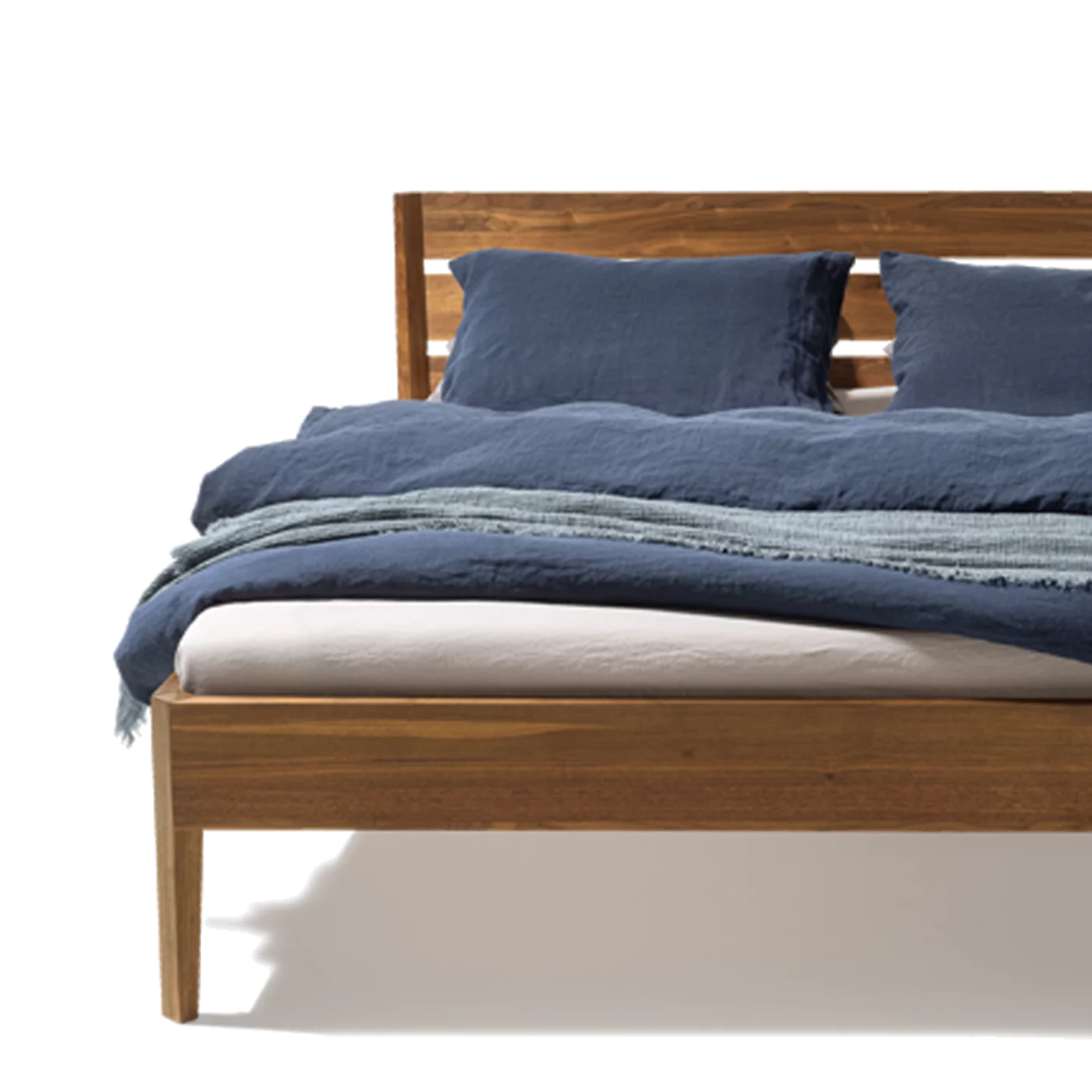 light wooden bed in real walnut