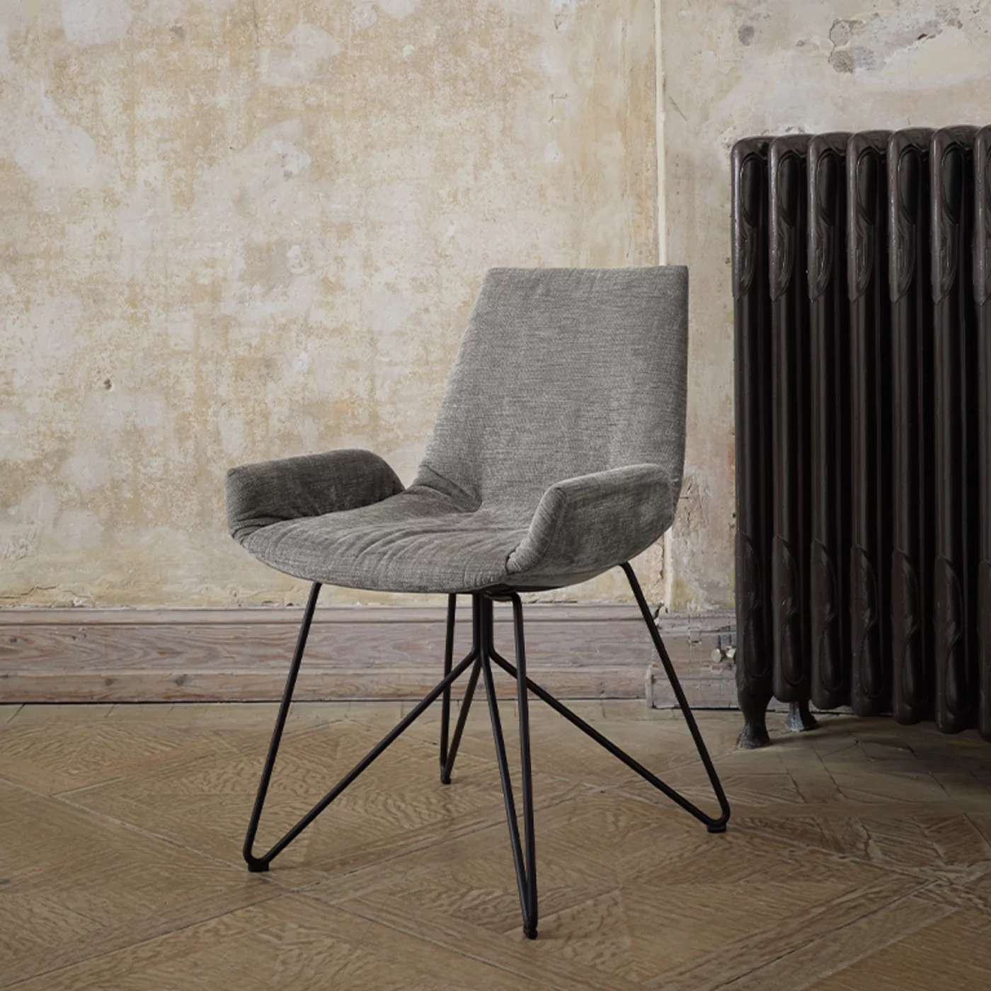 comfortable lui plus dining chair with fabric seat shell and wire frame in matt black