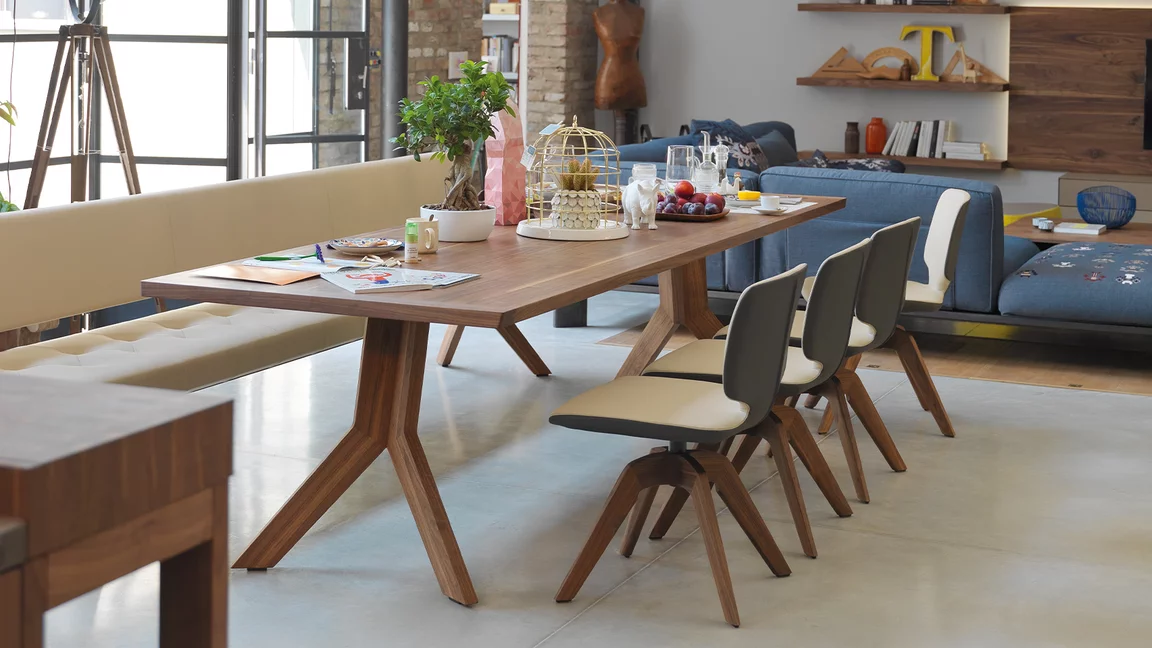 upholstered dining chairs aye swivel base in walnut with leather seat shell, yps dining table and yps bench