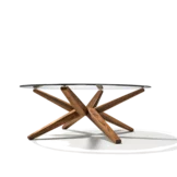 modern coffee table stern made of solid walnut with round glass top