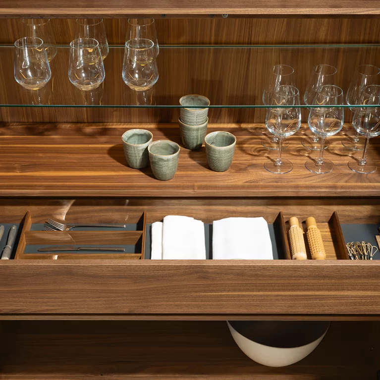 organised cutlery drawer and storage space in elegant filigno highboard in walnut