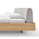 nox bed in wild oak white oil with leather headboard, detailed view