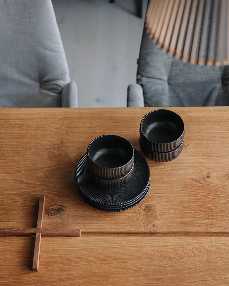 natural wood dining table echt.zeit in rustic brushed oak with burnished steel frame and lui léger chairs