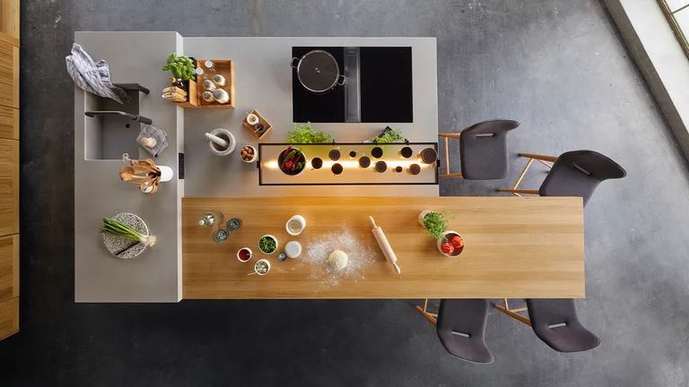 echt.zeit real wood kitchen in oak with work areas in three different heights
