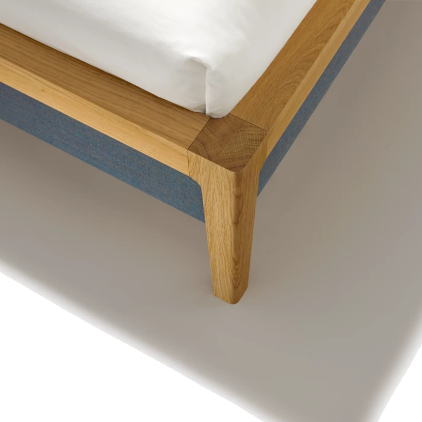 mylon bed with fabric bed sides in solid oak, detailed view