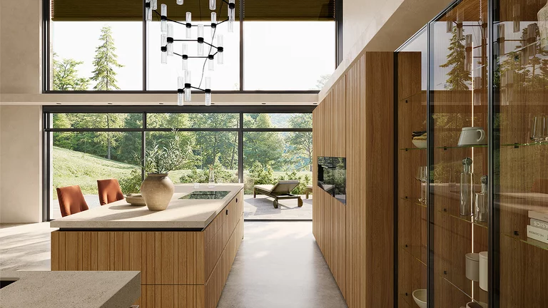 Modern solid wood designer kitchen echt.zeit evo in natural oiled oak with all-round recessed grip and clear glass cabinets