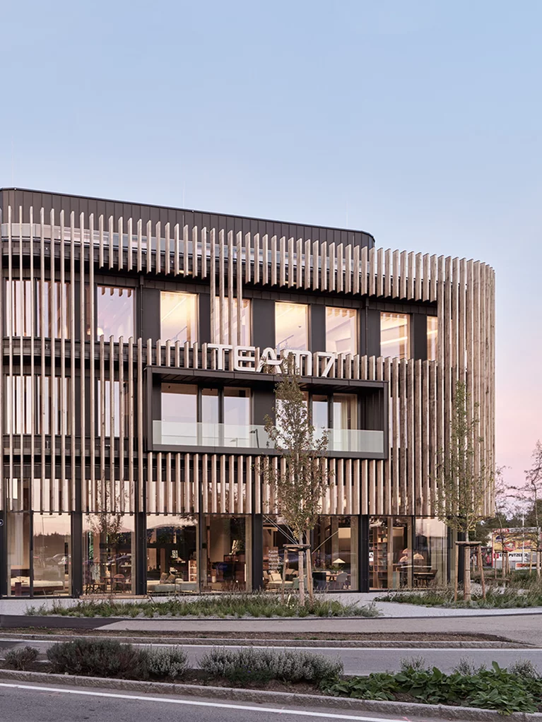 Exterior view of the TEAM 7 World at dusk