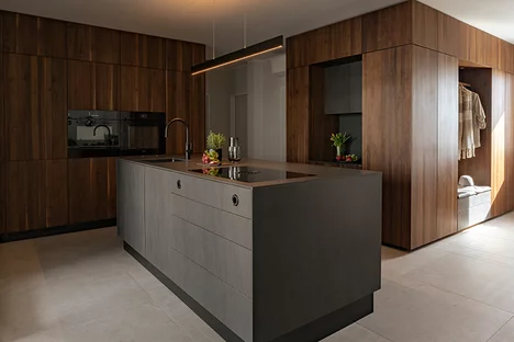Modern kitchen and hallway combination in solid walnut and ceramic