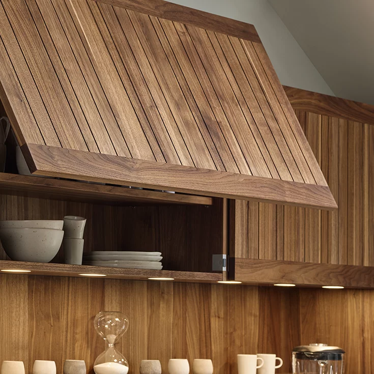 solid wooden kitchen wall unit with hs flap, detailed view echt.zeit wooden kitchen walnut wall unit with hs flap illuminated, detailed view