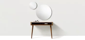 sol solitaire in solid walnut supported by two legs and worktop upholstered in leather, front view