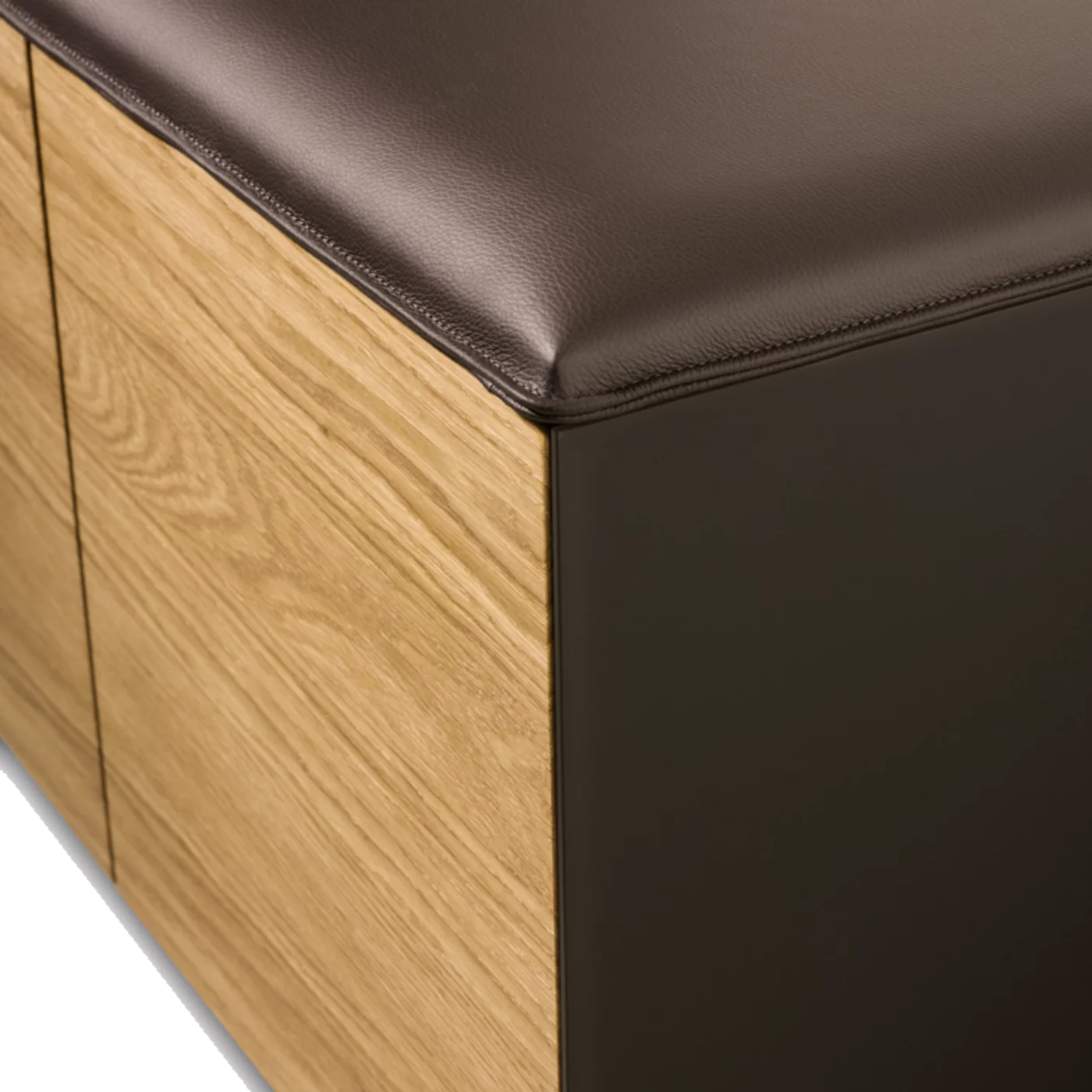 cubus pure sideboard with upholstered seating in leather and graphite grey coloured glass on the sides