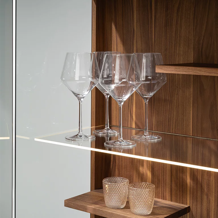 filigno highboard in walnut with illuminated glass shelves, detailed view