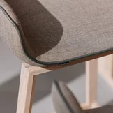 ark bar stool upholstered in oak white oil, detailed view