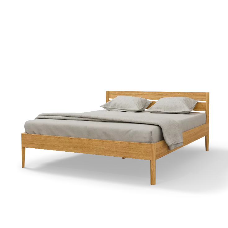 light solid wood bed in oak with tapered feet