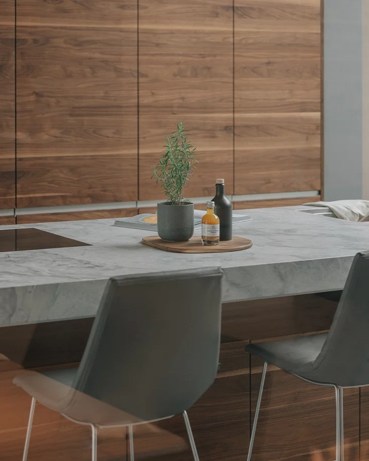 comfortable lui bar stool with leather backrest and matt black frame, back view