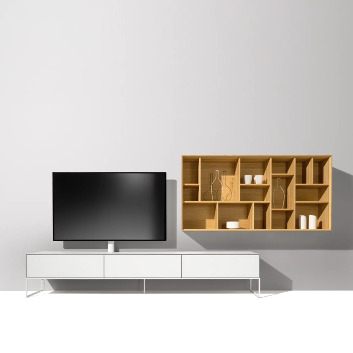 cubus pure wall unit with white coloured glass and snow-white frame combined with the graphic design element in solid oak