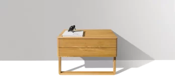 float bedside cabinet in oak with wood sliders and a large drawer