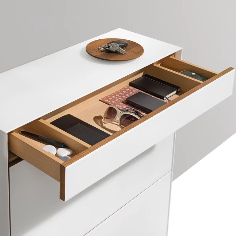 cubus shoe flap chest of drawers in solid walnut with coloured glass surround