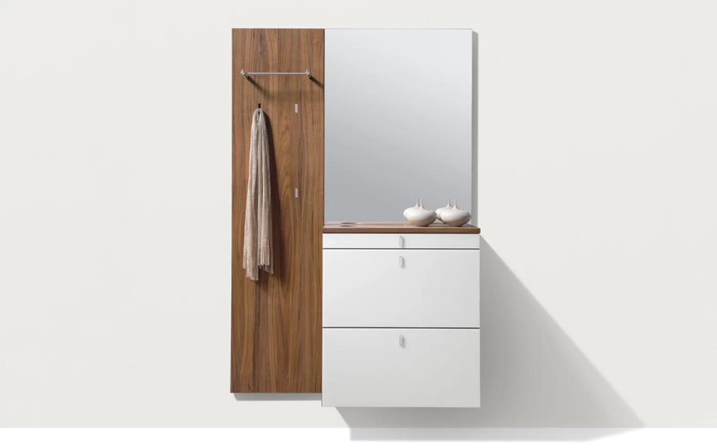 cubus hallway in walnut with the cubus shoe flap chest of drawers with coloured glass fronts, folding handles and key recess