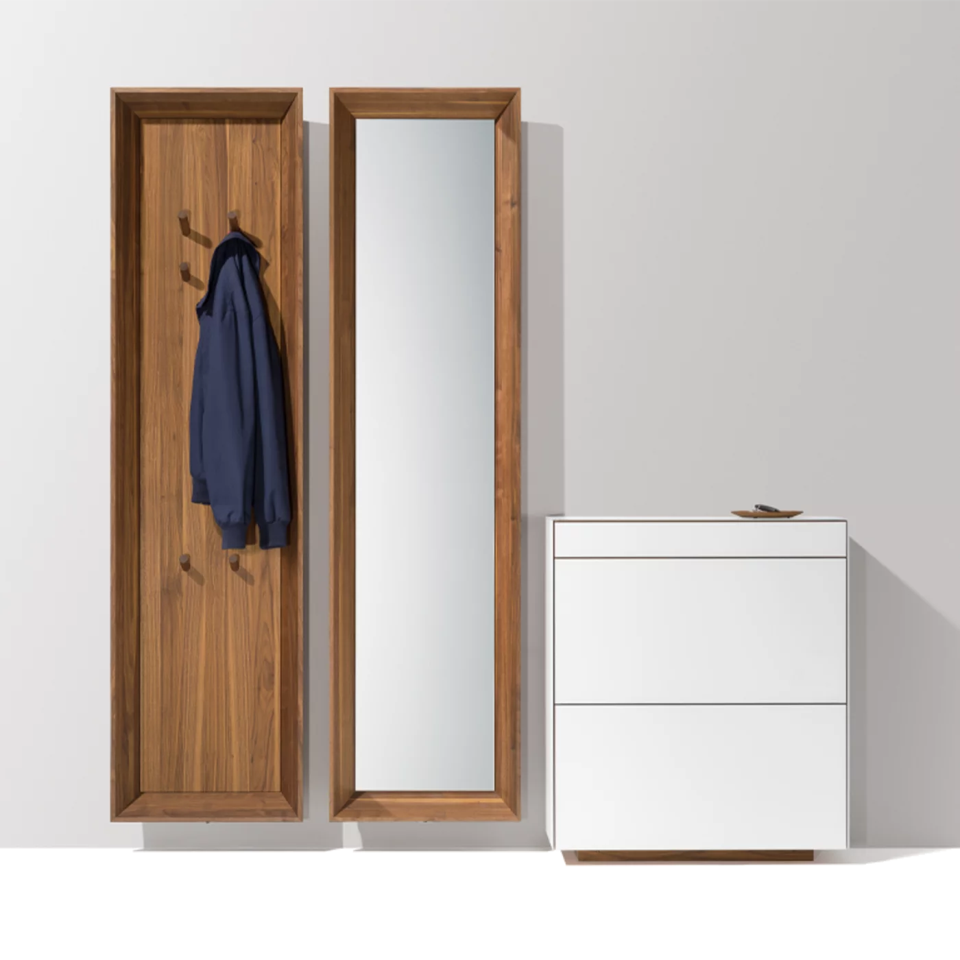 haiku wardrobe with hanging mirror panel in solid walnut and cubus pure hallway chest of drawers in white coloured glass