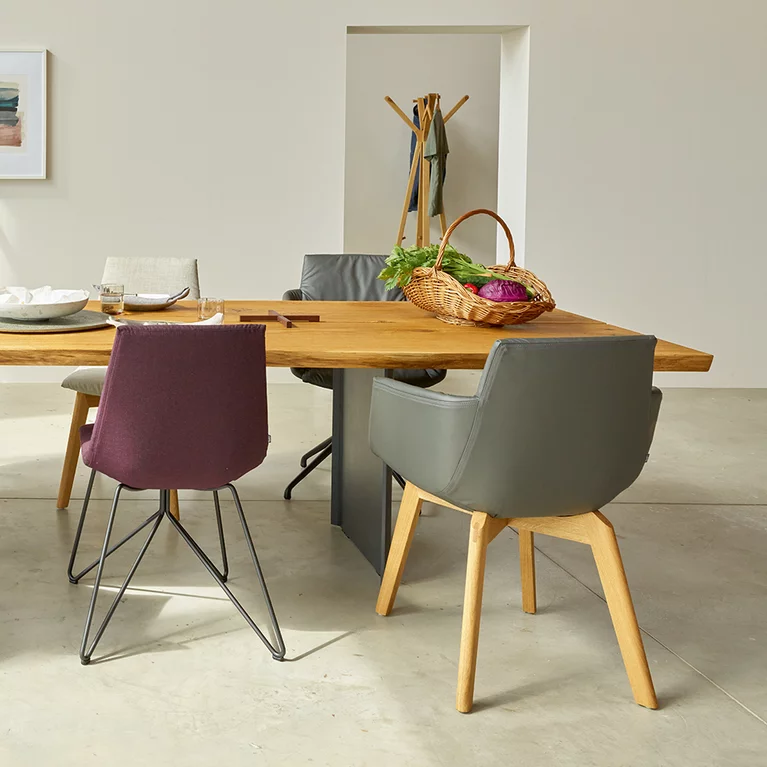dining room chairs lui in fabric and grand lui in leather with wood, swivel, wire frame and echt.zeit table