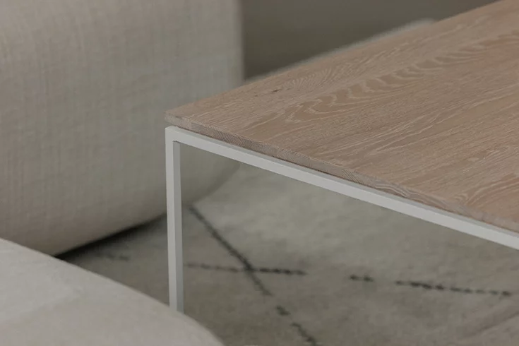 filigno living room table made of solid oak white oil with base frame in snow white, detail picture