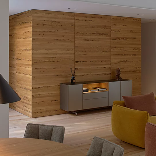 cubus pure sideboard with coloured glass casing on metal runners and illuminated oak niche in front of customised cabinet in venetian oak