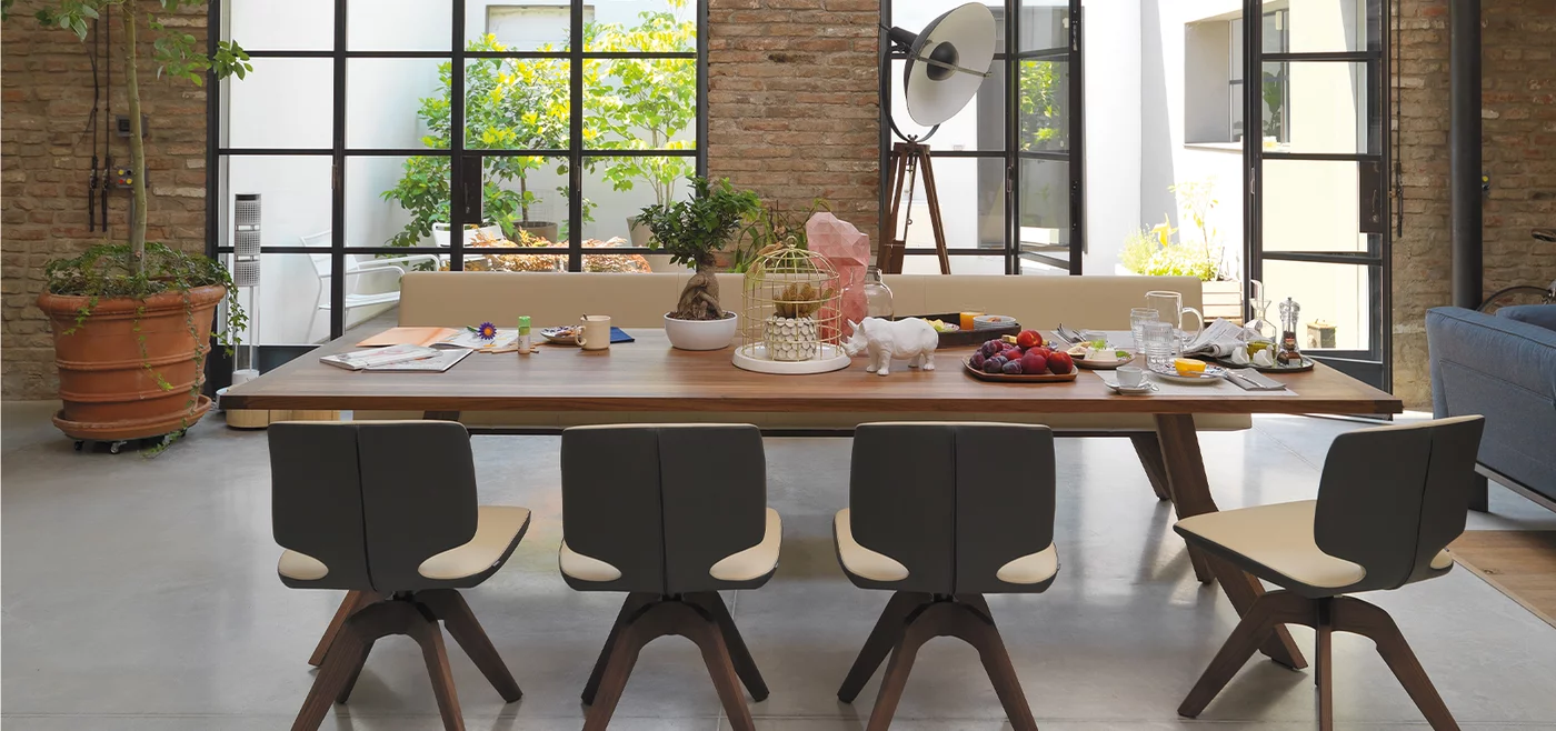 yps extendable dining room table in solid walnut with aye swivel base and the yps upholstered bench with backrest
