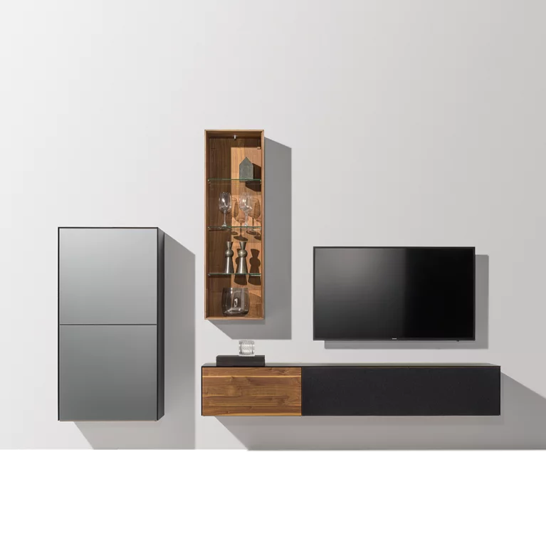 hanging wall unit in solid walnut with different glass colours, glass shelf and lighting