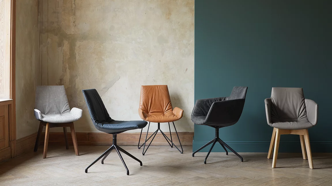 elegant lui chair family in leather or fabric with wooden, swivel or wire frame
