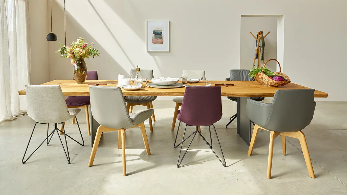 lui chair family in leather/fabric with wood, swivel, wire frame and echt.zeit table in solid oak