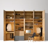 valore hinged door wardrobe illuminated in oak white oil with coloured glass anthracite matt matching the lui chair