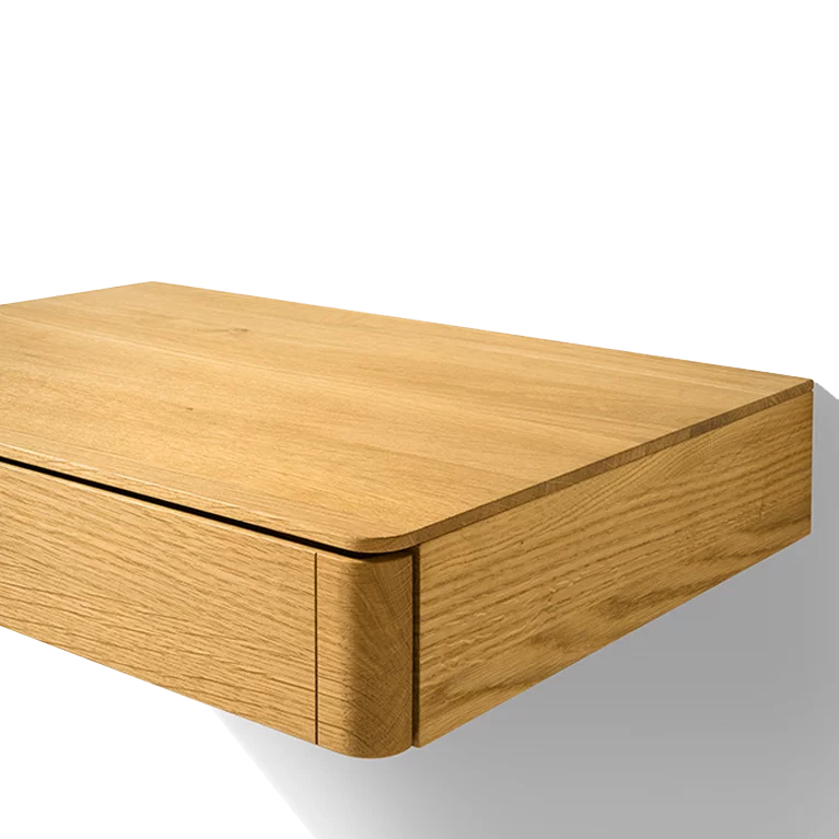 float bedside cabinet in oak with rounded corners
