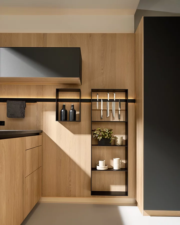 pur wooden kitchen in solid oak with coloured glass graphite grey matt and sign niche element illuminated