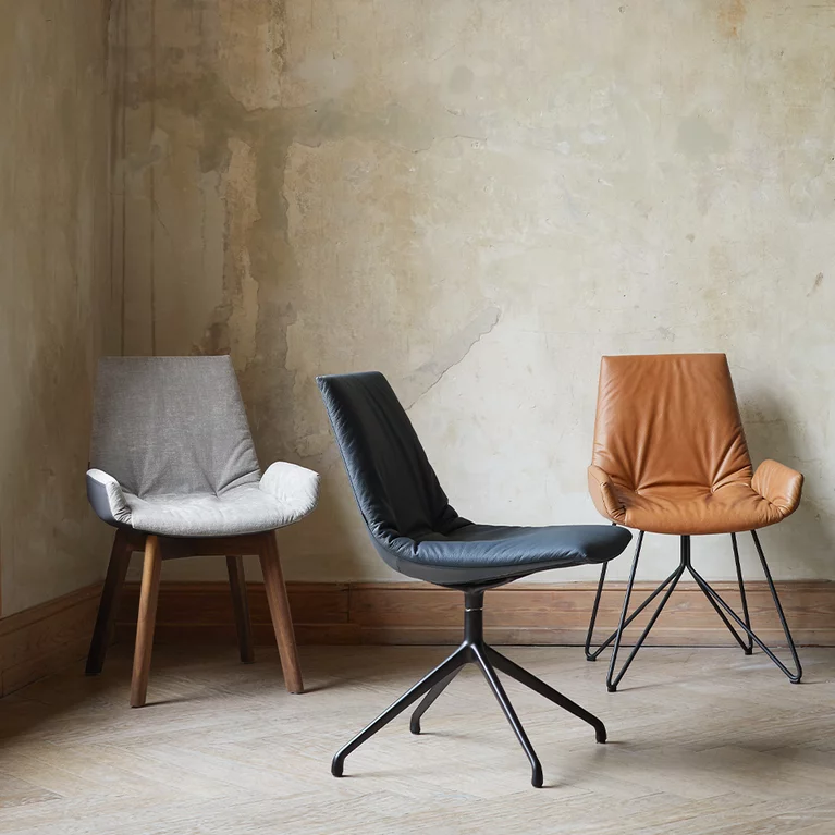 elegant lui chair family in fabric or with wooden, swivel or wire frame