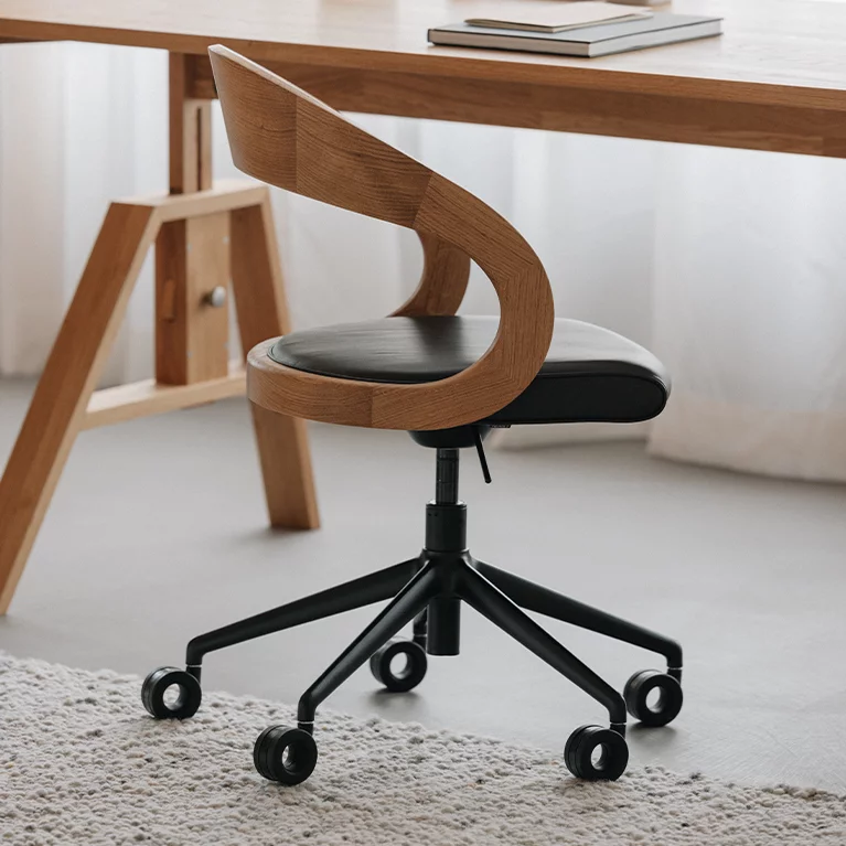 girado office swivel chair with wooden backrest in solid oak and leather seat on a black swivel base with castors