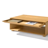 simple lux coffee table made of solid oak natural oil with drawer and storage space